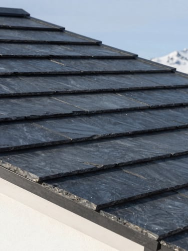 Architectural close-up of premium dark slate tiles perfectly aligned on a modern roof, sharp geometric lines, crisp alpine daylight, minimalist composition