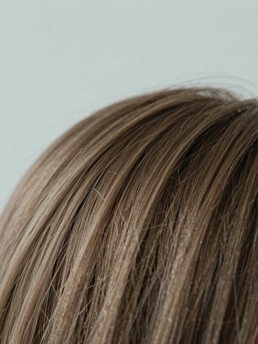 Macro shot of healthy hair texture under soft, diffused north-facing daylight, shallow depth of field, 35mm