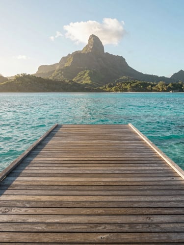 Wide environmental shot of a single empty wooden deck over crystal clear turquoise water in Bora Bora, soft morning light, distant volcanic peak, minimalist composition.
