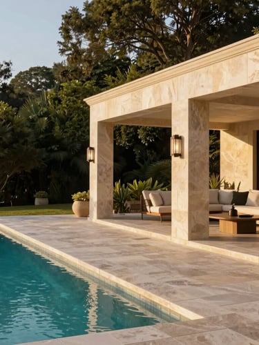 Panoramic architectural shot of a luxury poolside patio with crisp stone joints and modern outdoor living structures, golden hour light, generous negative space on the left, 35mm lens