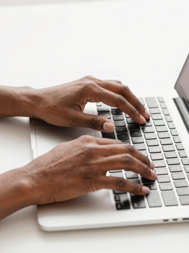 Close-up of a designer's hands reviewing a structured website wireframe on a modern tablet, warm natural morning light, shallow depth of field