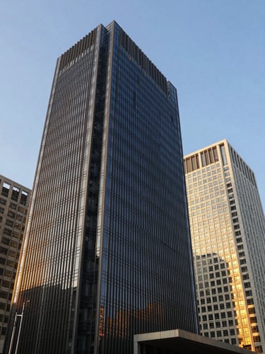 Wide-angle editorial corporate photography of a modern financial district in Mumbai, crisp daylight, architectural shadows, deep navy and warm gold tones, sharp focus, 35mm