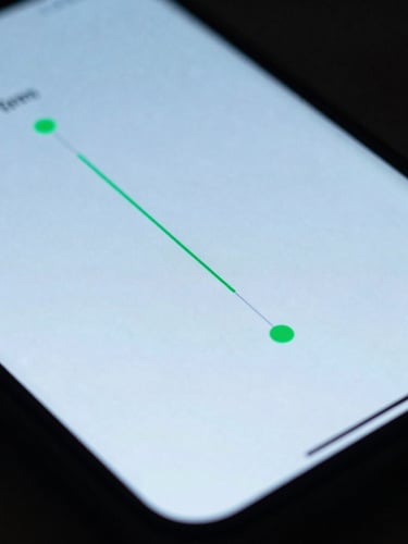 Macro shot of a high-resolution Android device screen displaying a fluid UI transition diagram, low-key dramatic lighting with neon green glow, sharp focus, 35mm