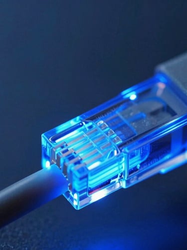 Macro shot of network fiber optic cables glowing with sharp cobalt blue light, clean technical layout.