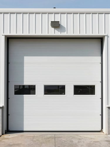 Sharp architectural photography of a physical garage door workshop on SW Barbur Blvd in Portland, clean industrial exterior, bright daylight, 35mm lens