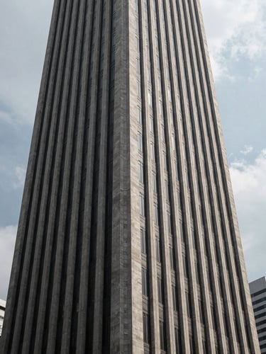 Low-angle architectural crop of Jakarta financial district skyscraper, sharp concrete lines, deep shadows, overcast daylight.