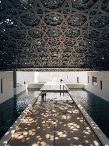 Architectural detail of Louvre Abu Dhabi dome, soft morning light reflecting on the stone floors, elegant editorial photography, medium format depth.