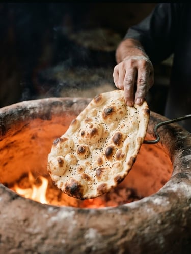 A close-up of fresh, blistered Afghan flatbread emerging from a glowing clay tandoor oven, warm dramatic side-lighting, steam rising, shallow depth of field, 35mm