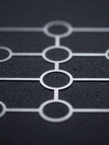 Macro crop of a clean node-based system diagram, silver lines on deep charcoal background, sharp focus, low-key lighting.