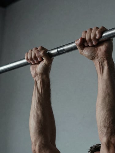 Close-up of a male athlete's hands gripping a steel pull-up bar, high-contrast cool-toned lighting, minimalist home workout setup.