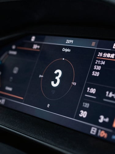 Macro close-up of a high-end digital dashboard displaying secure analytical data, low-key dramatic side-lighting, deep midnight-slate tones, sharp focus