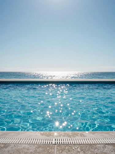 Wide-angle straight-on shot of a pristine sparkling blue swimming pool under bright harsh Florida midday sun, concrete deck, clear sky