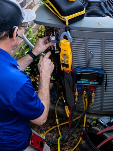 Our Tech working on a residential AC Condenser in Arlington TX