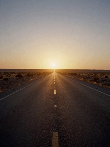 Cinematic wide shot of a dusty empty highway stretching into a warm golden hour sunset, low horizon, vintage 35mm film grain.
