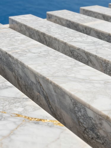 Close-up of polished golden-veined white marble slabs aligned geometrically in a bright, modern showroom, sharp architectural angles, 35mm