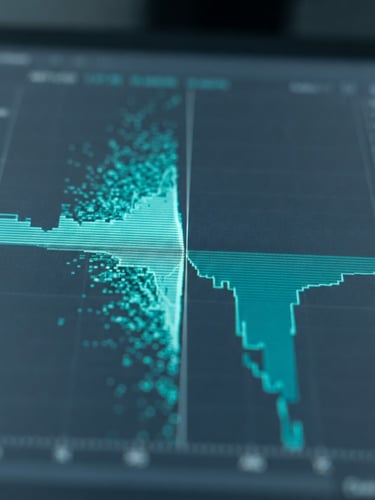 Macro close-up of a sleek financial terminal screen showing order book depth, cool diffused studio light, desaturated slate and sharp electric-teal accents, shallow depth of field