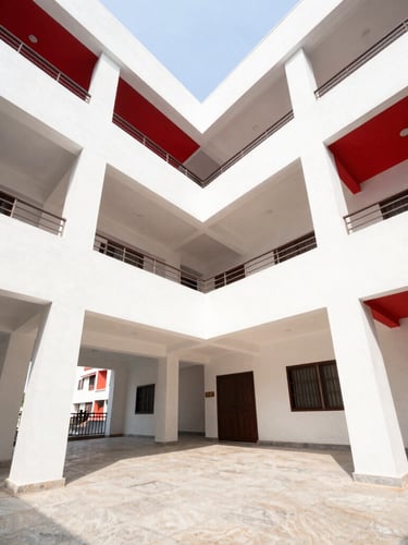 Bright architectural interior of a modern Kolkata apartment, natural daylight, high-contrast red accents, sharp focus, wide-angle lens