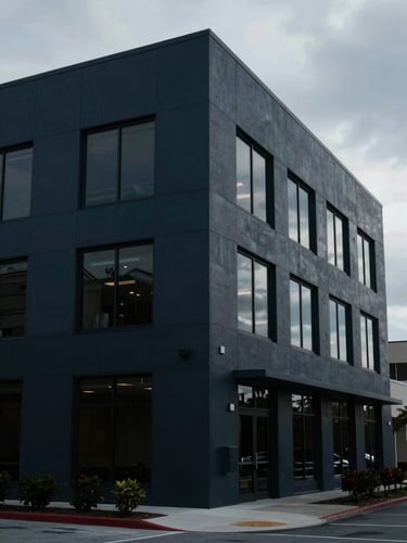 Exterior view of a modern, discreet office building in Saint James City, Florida, under overcast daylight, low-key lighting, professional and secure atmosphere.