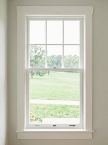 Bright interior photography of a sun-drenched living room, a clean white window frame looking out onto a lush green Iowa lawn, soft morning daylight, high-key lighting.