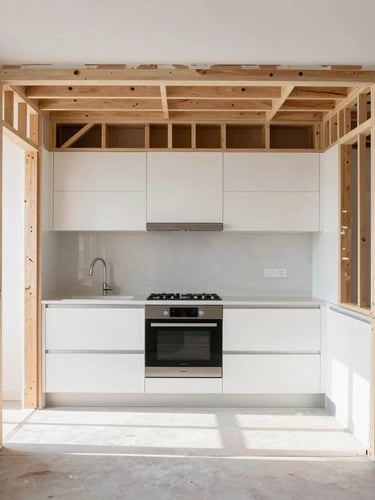 Straight-on architectural shot of a clean modern kitchen mid-remodel, exposed structural framing, bright natural daylight, high contrast, 35mm.