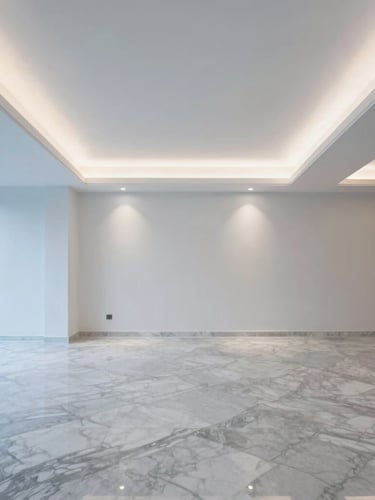 A beautifully finished modern villa interior with polished marble floors, clean painted walls, integrated LED lighting, professional architectural shot