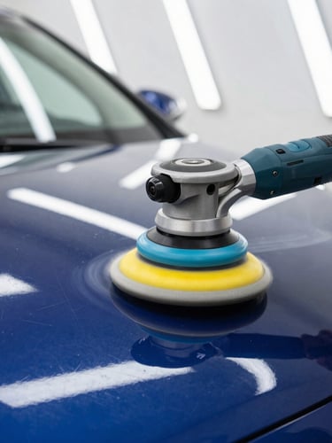 Close-up of a dual-action polisher glide over a deep blue car hood, bright overhead LED strip reflections showing a flawless, swirl-free finish, high-contrast sharp photography.