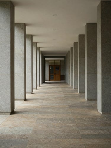 Symmetric long corridor of a modern administrative court, natural stone flooring, soft diffused daylight, quiet and calm atmosphere