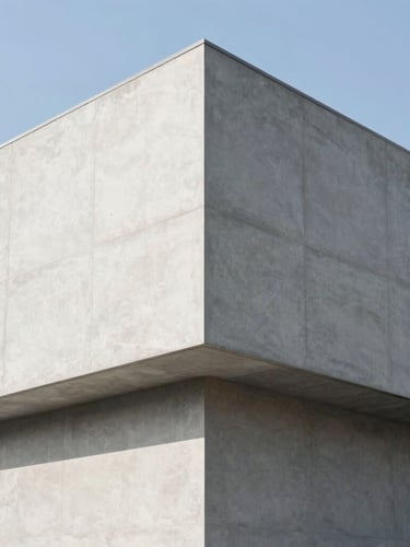 Wide architectural angle of a modern concrete building facade, sharp geometric shadows, bright natural daylight, corporate minimalist tone, 35mm lens.