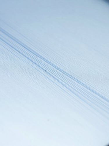 Clinical laboratory photography, sharp macro focus of a high-end comparison screen showing ballistic striations, cool blue and sterile white tones.
