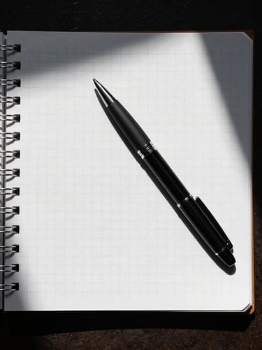 Top-down high-contrast flat lay of physical productivity tools, a heavy black pen resting on a stark white gridded notebook, sharp directional desk lamp shadow, utilitarian aesthetic.