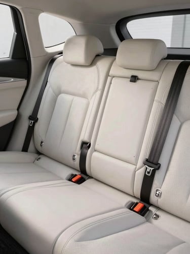 Pristine leather cabin of a modern luxury vehicle, soft daylight illuminating the clean dashboard and immaculate stitching, zero clutter.