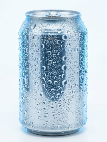 Macro studio shot of a condensation-beaded aluminum can of Vitaaqua, sharp reflections, ice-blue backlighting, minimalist white backdrop, 50mm