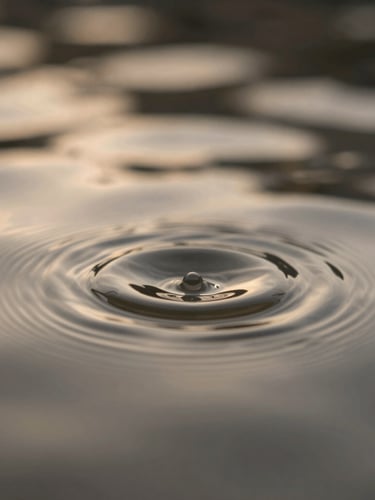 Ethereal fine-art photography of soft-focus water ripples under low-contrast, warm pearlescent backlit ambient light, shallow depth of field, 35mm