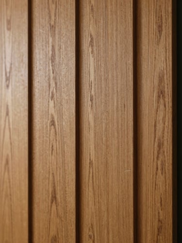 Close-up of premium vertical oak wood panels, highlighting the deep 3D texture and natural grain, soft side-lighting, warm architectural photography