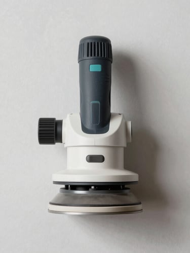 Symmetrical architectural shot of a dust-extraction sanding tool flat against a smooth, primed wall, crisp white work light, immaculate workspace.