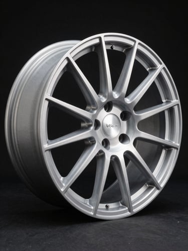 Three-quarter profile studio shot of a single forged aluminum wheel, VR-1 monoblock design, shot tight against a pure black background. Hard directional strobe from upper left casts a defined shadow along the spoke edges, revealing every machined surface and finish texture. The wheel fills 80% of the frame; negative space pools in the lower-right corner. No car, no context, no lifestyle — only the wheel as a documented object.