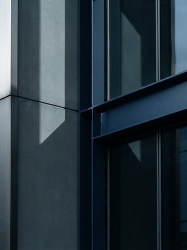 Minimalist close-up of structured architectural lines, sharp shadows, cool diffused daylight, premium business intelligence aesthetic, 35mm.