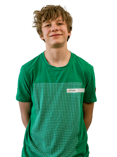 a boy in a green shirt 