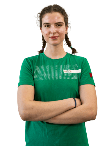 a girl in a green shirt 