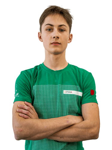 a boy in a green shirt 