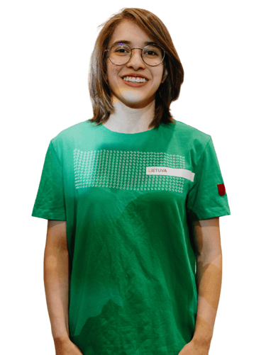 a girl in a green shirt 