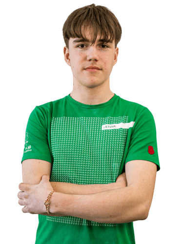 a boy in a green shirt 