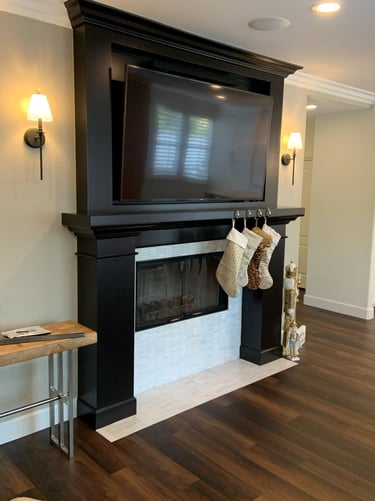 TV mounted above fireplace built by At Hand Heroes – Peoria AZ