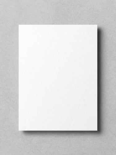 Crisp editorial photo of a minimalist corporate stationery suite on a light gray concrete surface, desaturated tones, 50mm lens