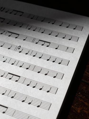 A vertical high-contrast preview of a string quartet score page, crisp black notation on white paper, tight crop on violin and cello staves, elegant modern typography