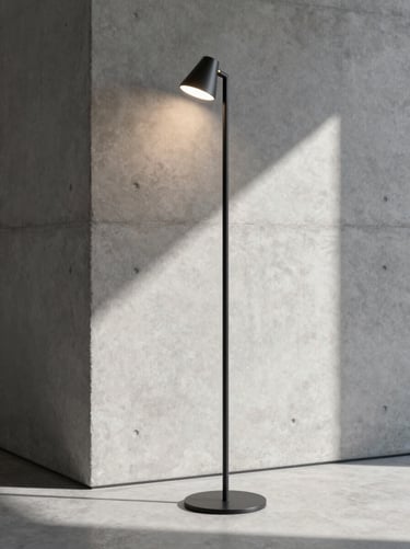 Ultra-slim matte black floor lamp standing in a modern concrete gallery space, sharp linear shadows, 35mm