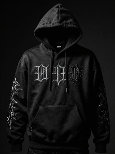 High-contrast black and white studio shot of a premium black hoodie with heavy gothic embroidery on the chest and sleeves, dramatic lighting.