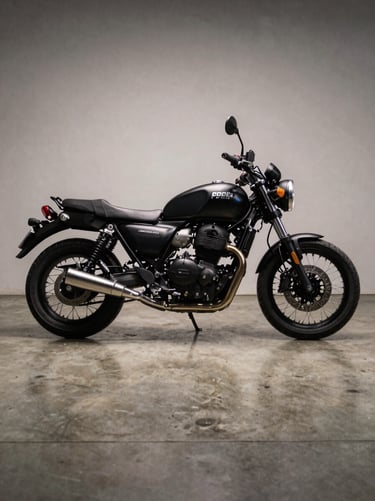 Wide low-angle shot of a premium motorcycle parked on polished concrete showroom floor under controlled studio strobe light, hard shadows defining the silhouette, matte black body with chrome details, no rider, neutral backdrop