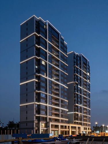 A modern real estate construction site in Chennai at twilight, dramatic architectural lighting