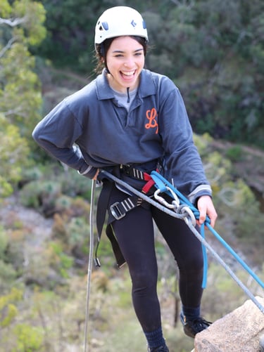 Abseiling down cliffs with the St Vincent Gulf as a view, building confidence and conquering fears.
